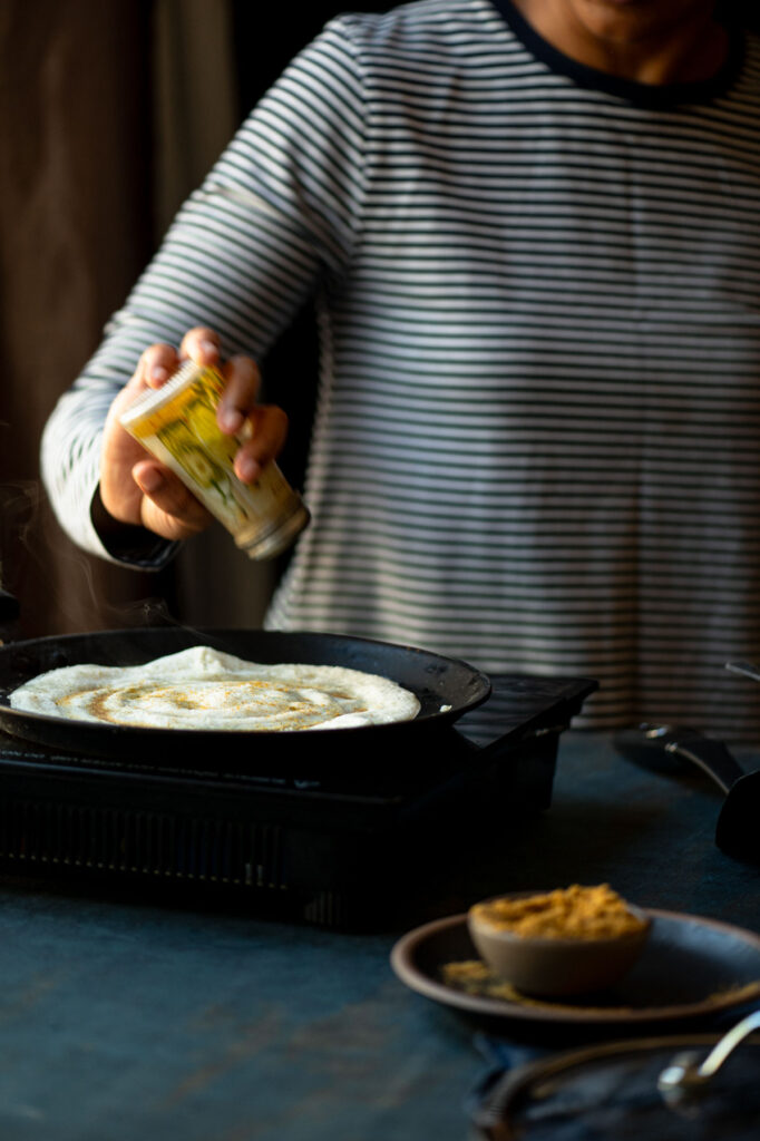 Alternatively spread the idli podi on the dosa through a bottle with holes.