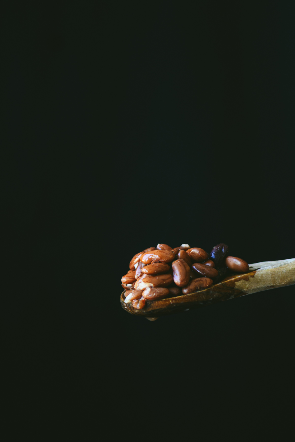 This is a picture of pressure cooked rajma beans on a spoon.