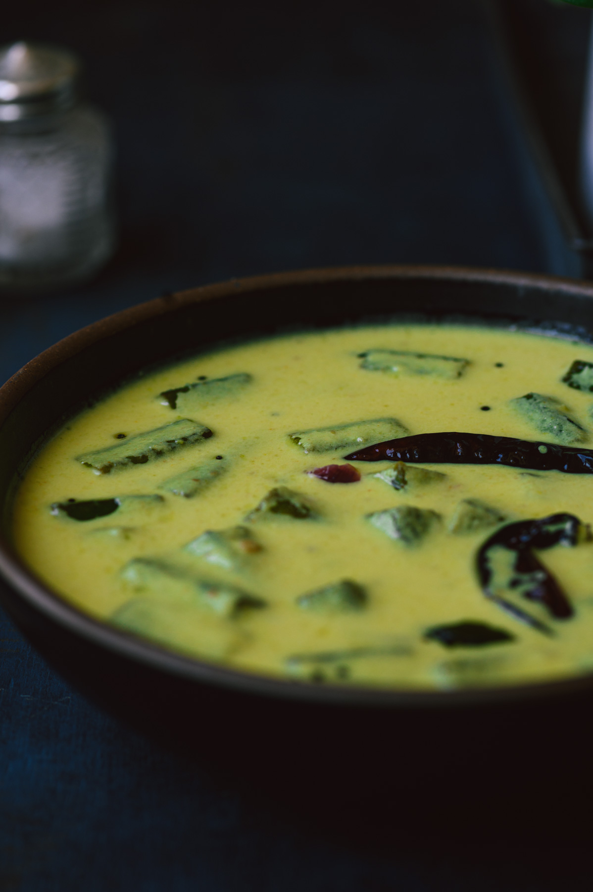 Vendakkai Mor Kuzhambu served on a bowl.