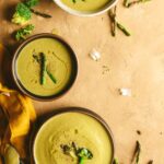 Almond Broccoli Asparagus Soup serevd on 2 bowls.