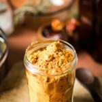 This is a picture of vatha kuzhambu podi in a jar.