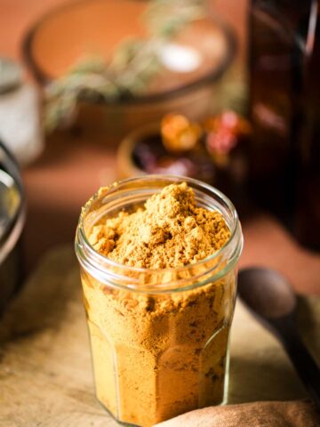 This is a picture of vatha kuzhambu podi in a jar.